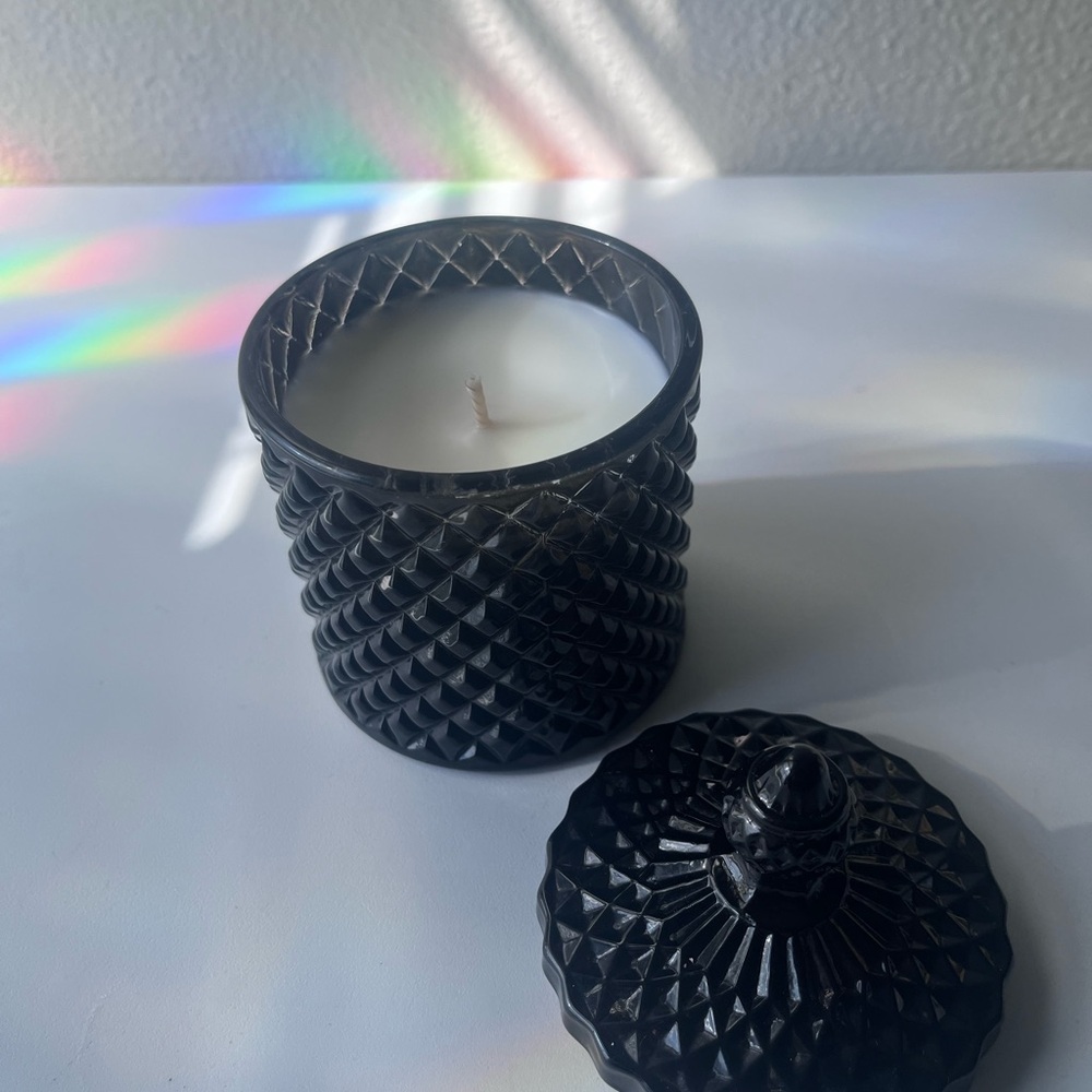 Black glass carousel massage soy candle